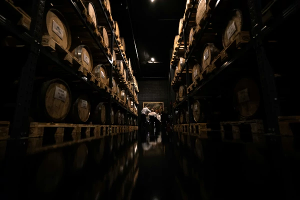 The aging process of spirits like whiskey and rum